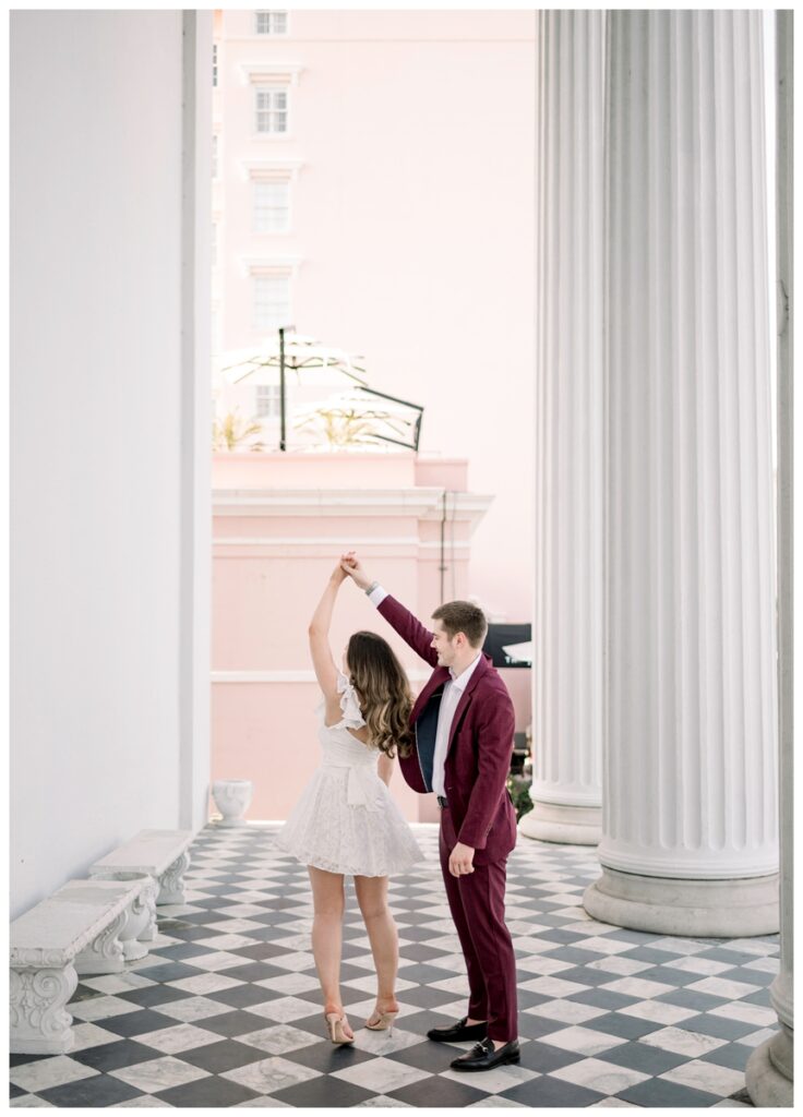 couple dancing on the porch of hibernian Hall in charleston south carolina