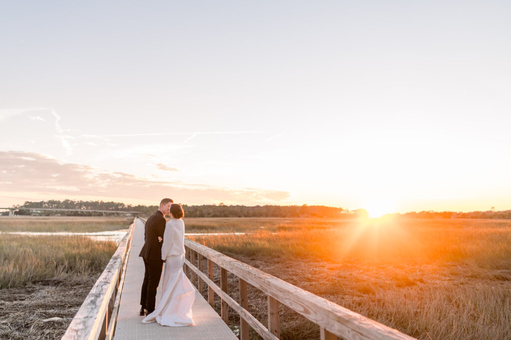 bride and groom at sunset during their modern day fairy tale wedding in savannah