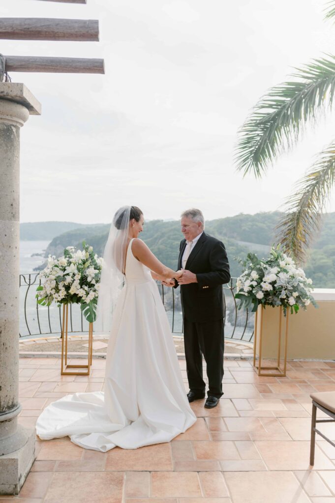 father daughter first look on rooftop in mexico
